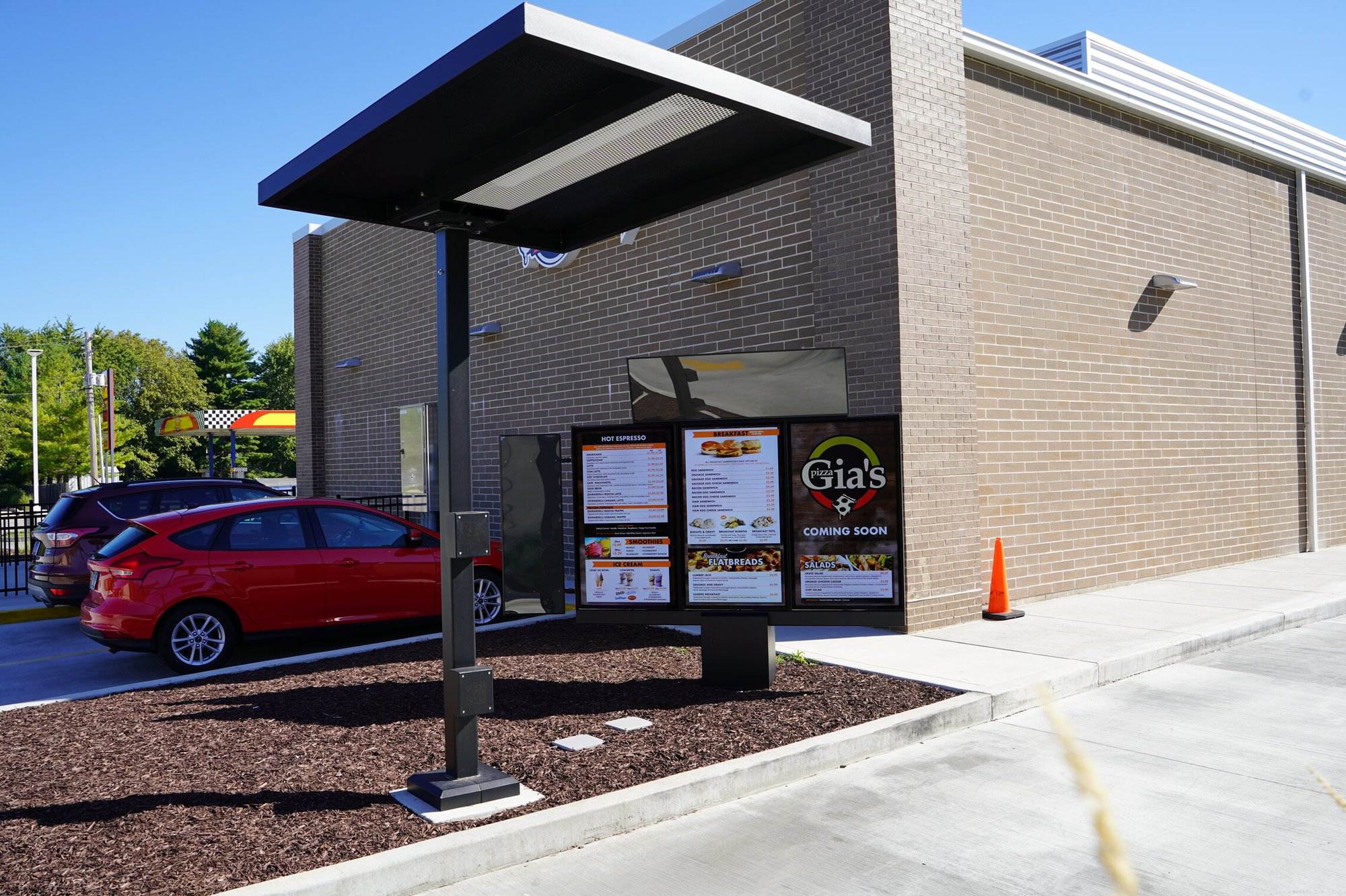 Moto Mart Flat top canopy and DT Flex with a wing and topper for their c-store drive thru Moto Mart Flat top canopy and DT Flex with a wing and topper for their c-store drive thru