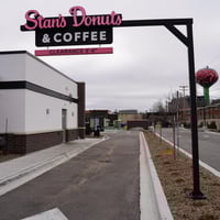 Custom-branded clearance bar for a drive-thru donut shop.
