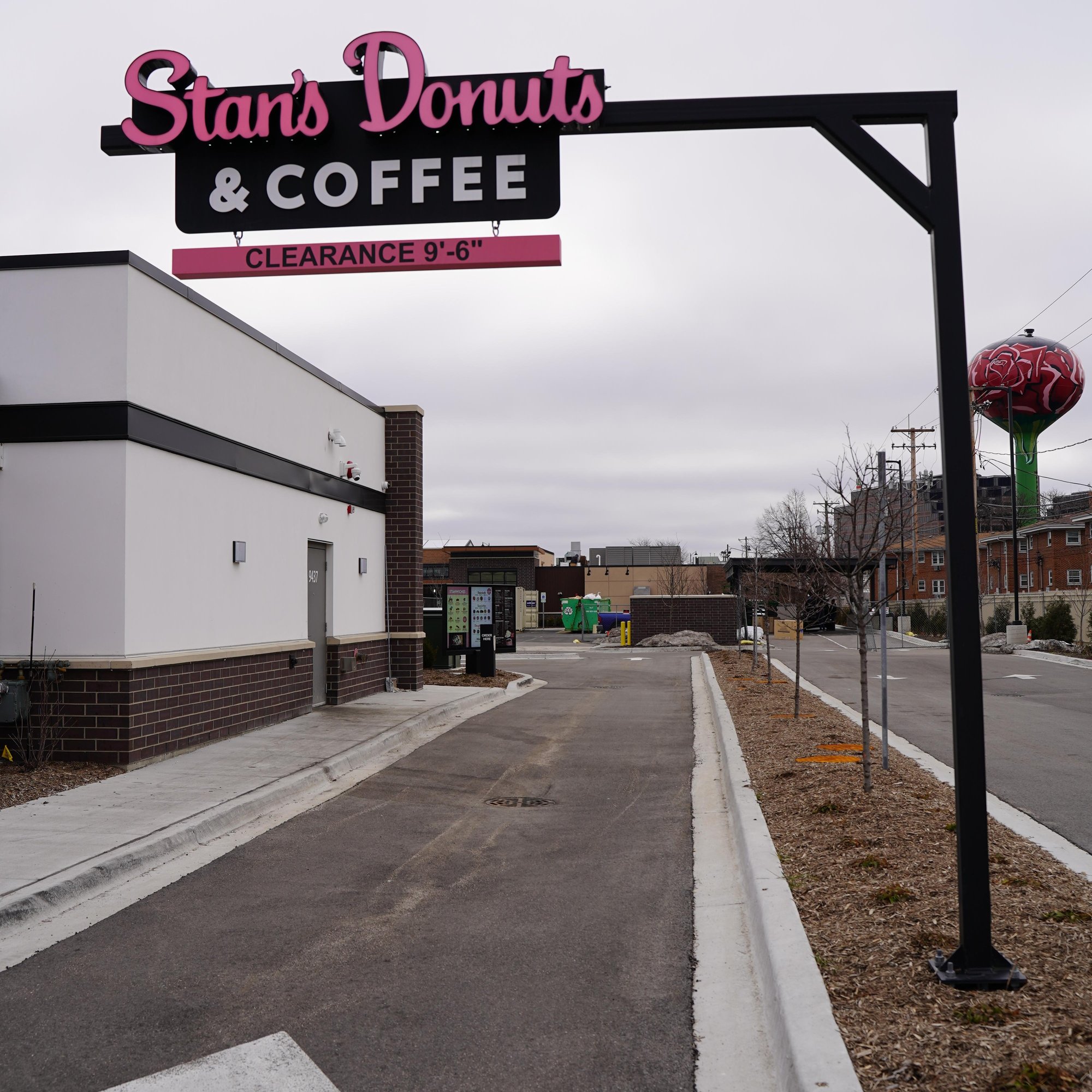 The Howard Company Custom-branded clearance bar for a drive-thru donut shop. The Howard Company Custom-branded clearance bar for a drive-thru donut shop.
