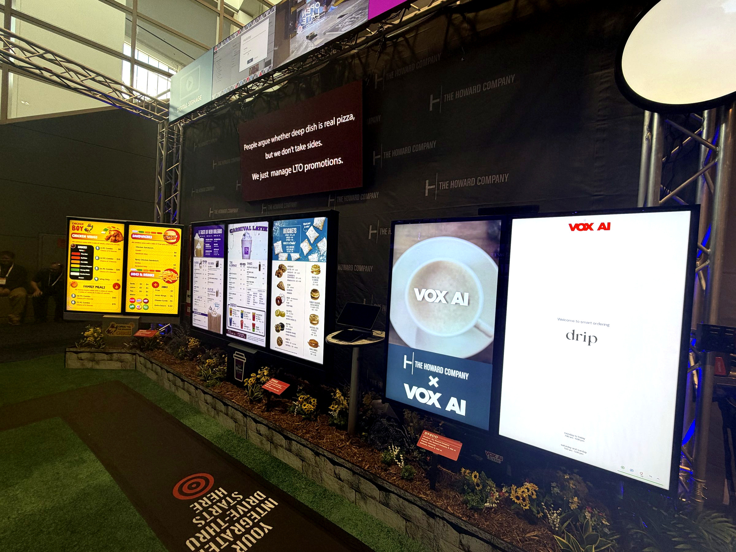 The Howard Company x VOX AI partnership panel with the DT-Flex Eco screens and digital menu boards at NRA 2026