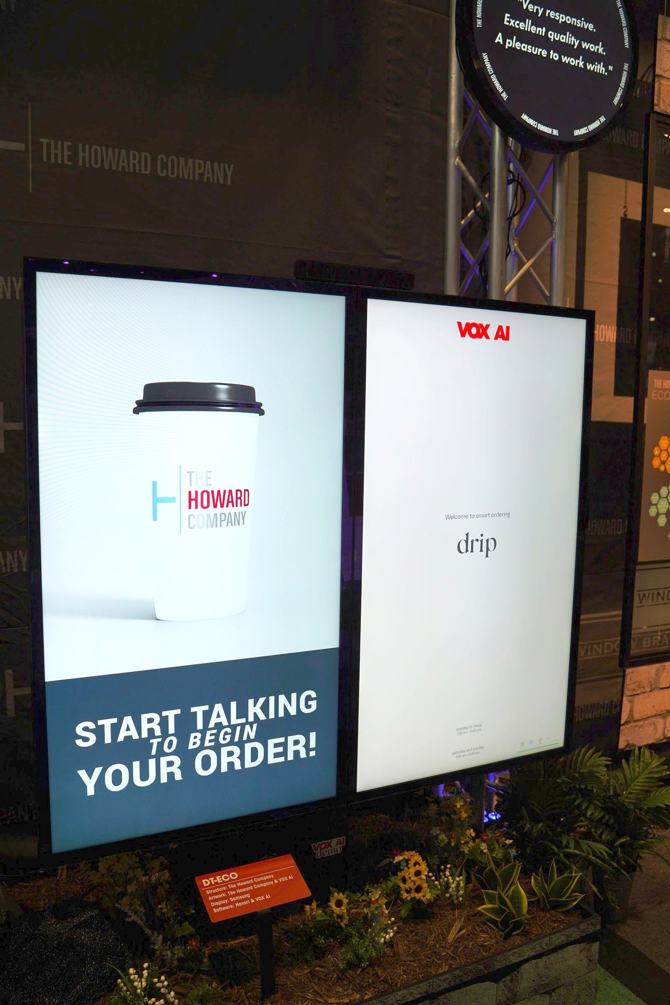 Close up of the DT-Flex Eco VOX AI voice ordering screens with a Howard Company cup and a Start Talking message at NRA 2026