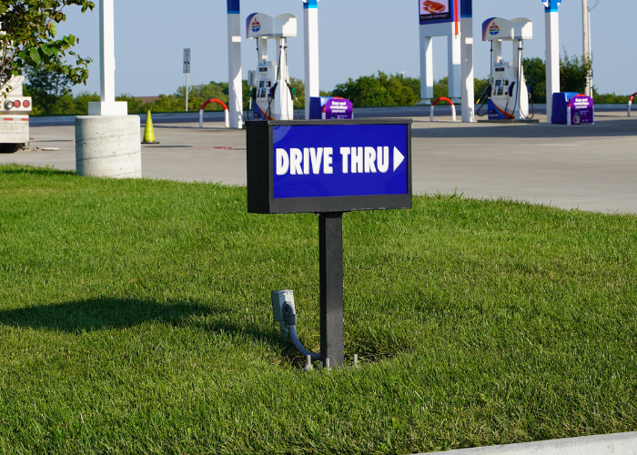 Directional Sign moto mart gas station Directional Sign moto mart gas station